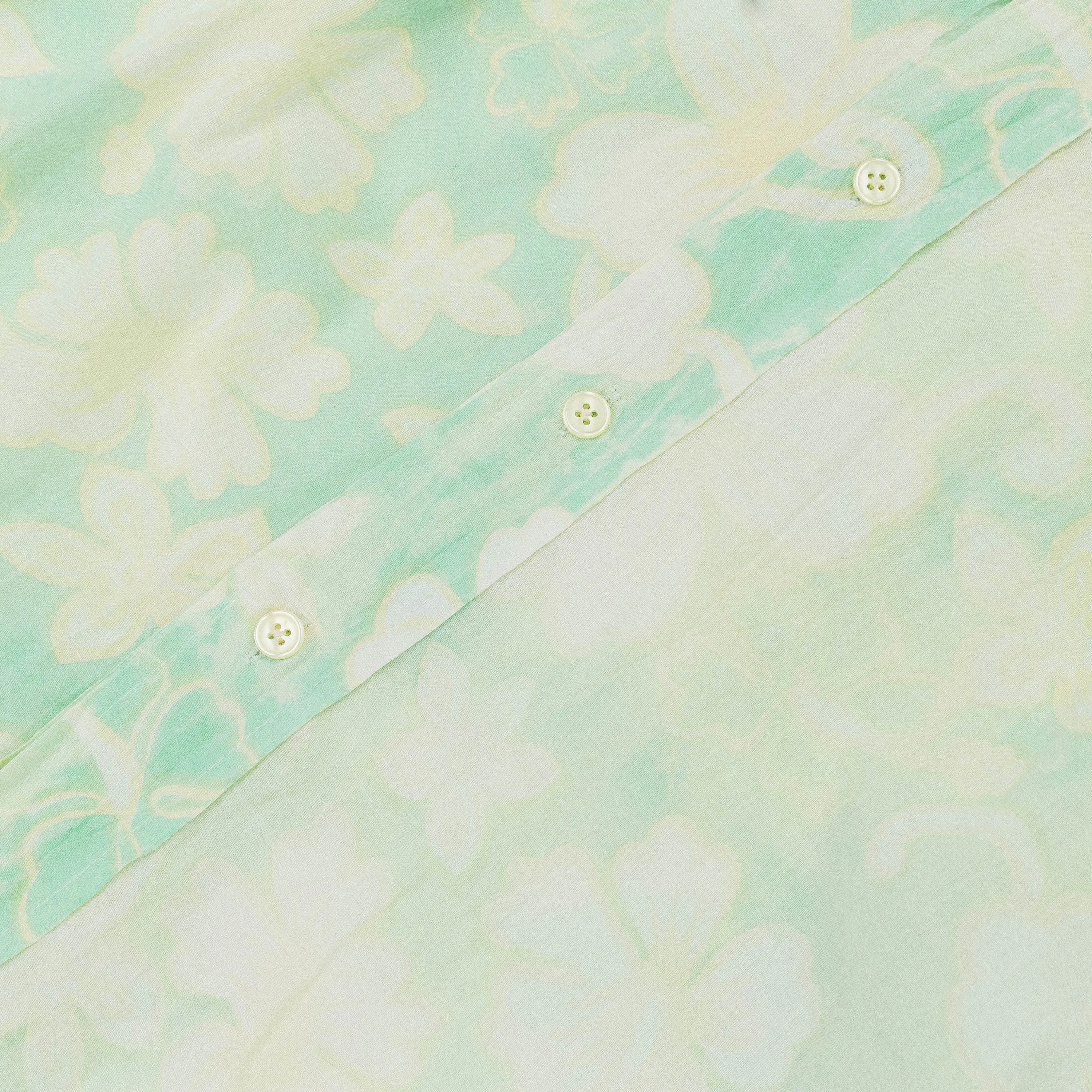 BLUE/WHITE PRINTED AND BLEACHED FLORAL BLOUSE